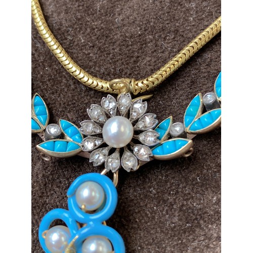 41 - A Victorian gold necklace, the snake chain suspending swags of channel set turquoise leaves interspe... 