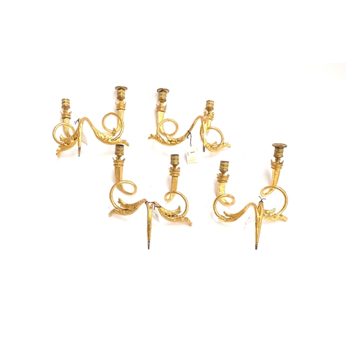 22 - A set of four Louis XV giltwood twin fitting wall sconces with acanthus detail and crenellated bobec... 