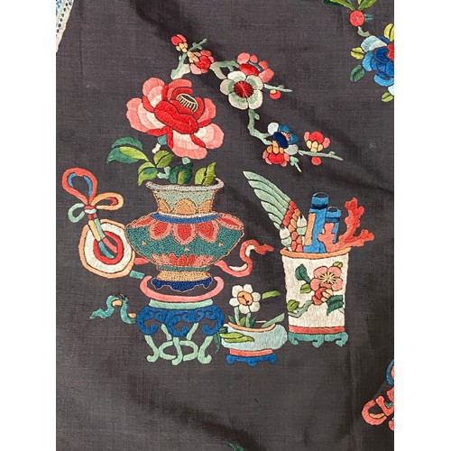 2222 - A late 19th/early 20th century Chinese silk robe, embroidered in satin stitch and Peking knot with p... 