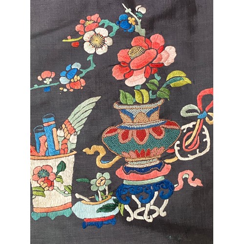 2222 - A late 19th/early 20th century Chinese silk robe, embroidered in satin stitch and Peking knot with p... 