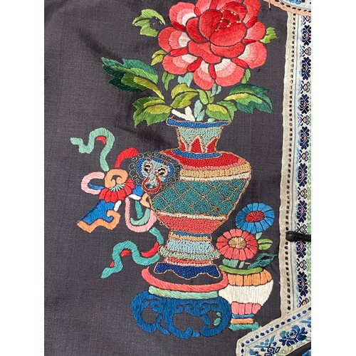 2222 - A late 19th/early 20th century Chinese silk robe, embroidered in satin stitch and Peking knot with p... 