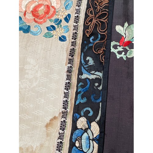 2222 - A late 19th/early 20th century Chinese silk robe, embroidered in satin stitch and Peking knot with p... 