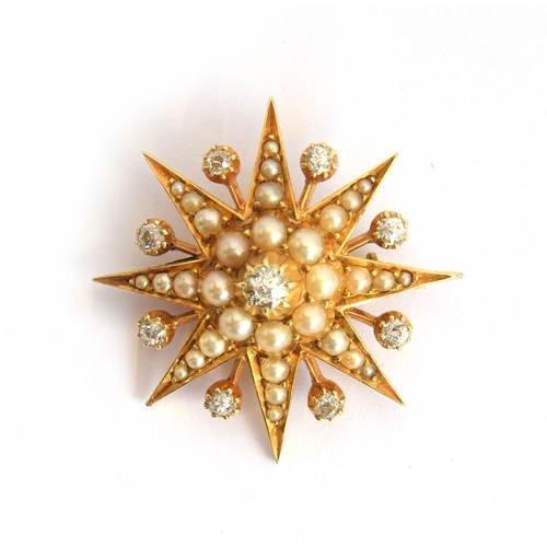 59 - A late 19th/early 20th century gold mounted star burst brooch set with old cut diamonds and split pe... 