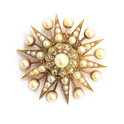 50 - A Victorian gold, pearl and diamond star form pendant/slide, the large pendant drop 4cm diameter, su... 