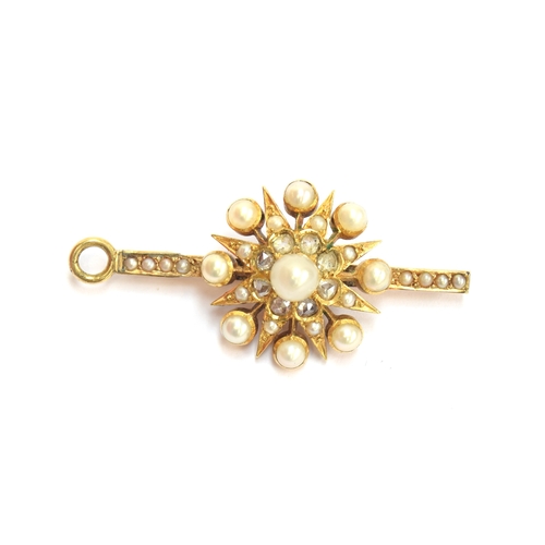 50 - A Victorian gold, pearl and diamond star form pendant/slide, the large pendant drop 4cm diameter, su... 
