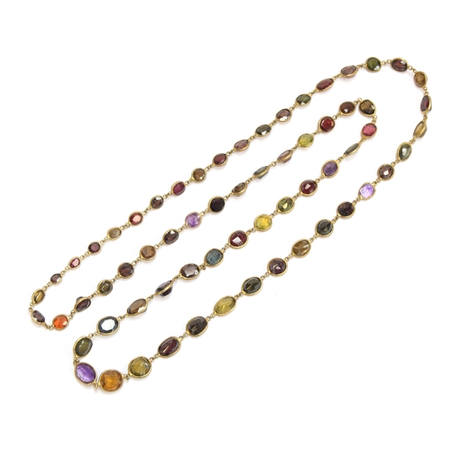 36 - An early 20th century gold mounted multi gem set riviere necklace, the stones in bezel settings, to ... 
