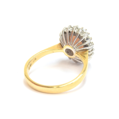 17 - An 18ct yellow gold, opal, and diamond cluster ring, the opal 9x7.5mm, size M, 5.1g