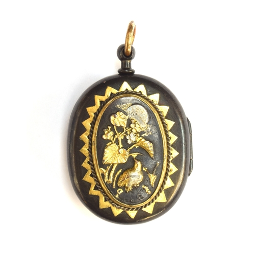 52 - A 19th century Japanese Shakudo locket, with applied silver and gold decoration, one side depicting ... 