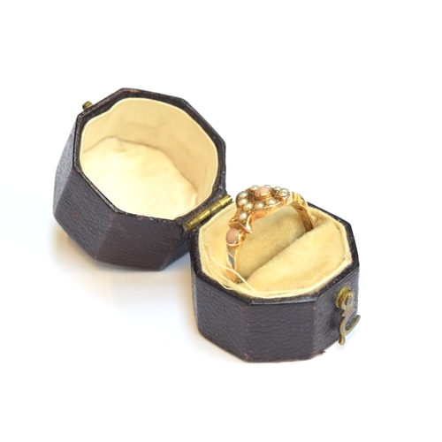 6 - A Victorian 15ct gold ring set with angel skin coral and pearls, size P 1/2, 2.3g, in 19th century o... 