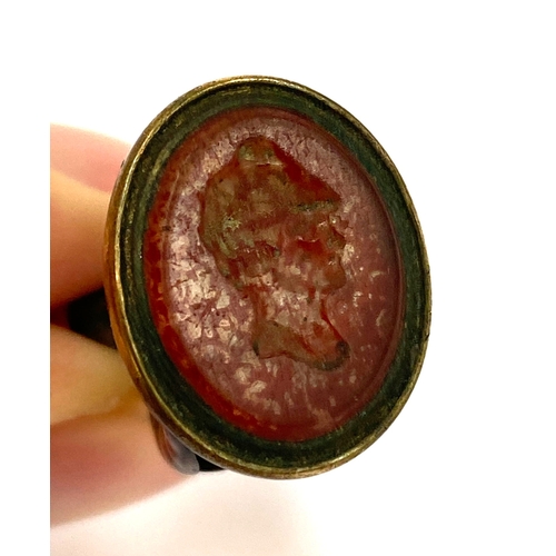17 - A Georgian gilt metal fob seal set with a paste tassie of a youth in profile, 2.5cmH
