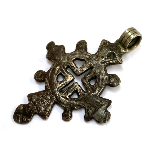 34 - An Ethiopian white metal Coptic cross, 5cmL, 7.4g