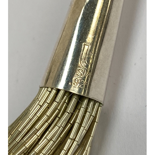 51 - A 925 liquid silver multi strand necklace, the caps stamped 'b sm .925', 40cmL unclasped, 69.2g