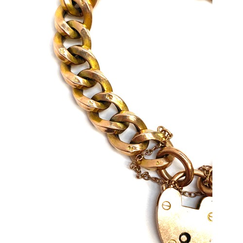 22 - An antique 9ct gold filled(?) curb link bracelet, each link stamped '9C', one link stamped 'GF', the... 