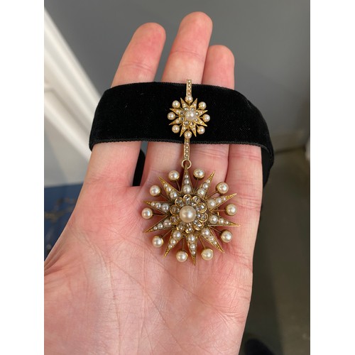 50 - A Victorian gold, pearl and diamond star form pendant/slide, the large pendant drop 4cm diameter, su... 