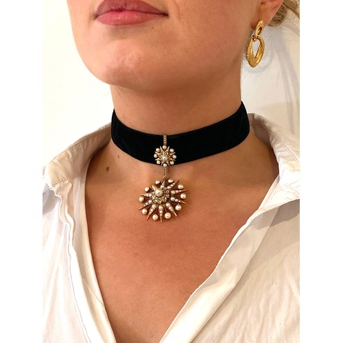 50 - A Victorian gold, pearl and diamond star form pendant/slide, the large pendant drop 4cm diameter, su... 