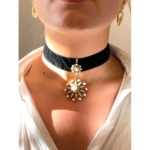 50 - A Victorian gold, pearl and diamond star form pendant/slide, the large pendant drop 4cm diameter, su... 