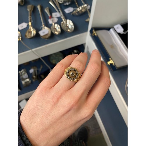 3 - A heavy 19th century gold and diamond cluster ring, the diamonds set in cut down silver settings, fl... 
