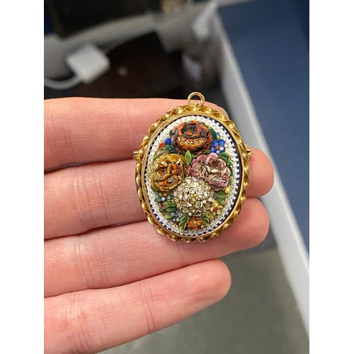 53 - An early 20th century gold mounted micro mosaic brooch/pendant, high relief floral bouquet, glazed l... 