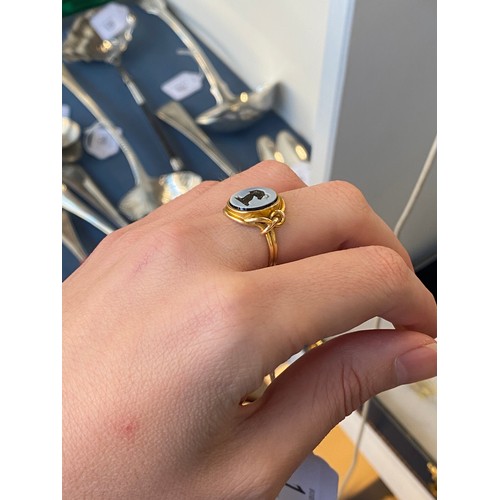 1 - A Victorian 18ct gold nicolo intaglio ring, the agate carved with the crest of a horned ram, possibl... 