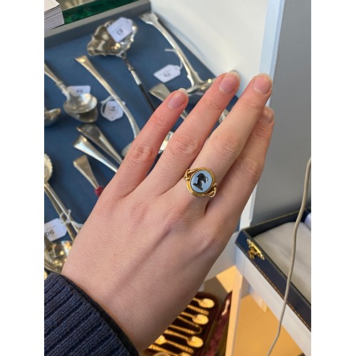 1 - A Victorian 18ct gold nicolo intaglio ring, the agate carved with the crest of a horned ram, possibl... 