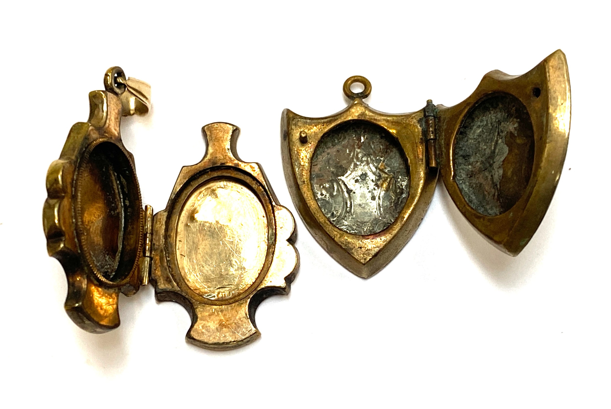 Two Victorian gilt metal engraved lockets, one shield shaped, 2.5cmL ...