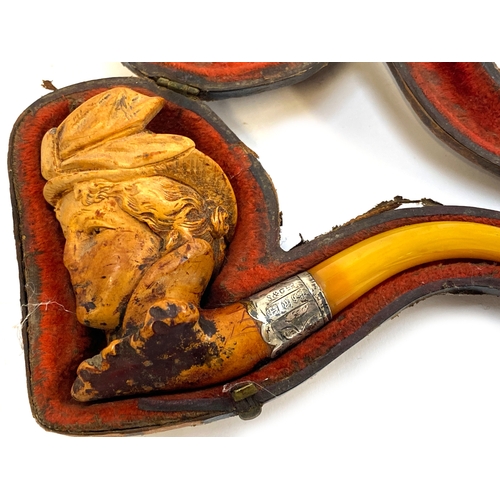 49 - Two silver collared pipes: one Meerschaum pipe in the form of a lady wearing a hat and one other wit... 