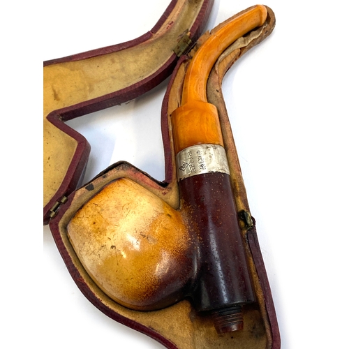 49 - Two silver collared pipes: one Meerschaum pipe in the form of a lady wearing a hat and one other wit... 