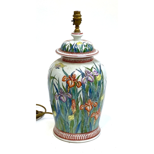 1084 - A large ceramic table lamp decorated with irises, 40cmH to base of fitting