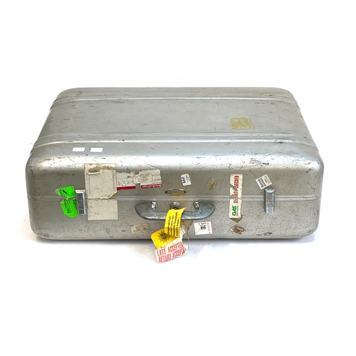 1110 - A vintage 1950s Halliburton aluminium suitcase, with travel stickers, 61cm wide