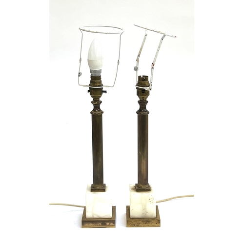 1143 - A pair of gilt metal and onyx column table lamps on square stepped bases, 30cmH to base of fittings