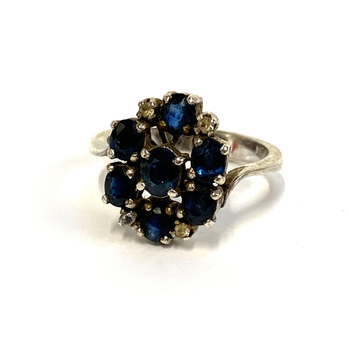 16 - A silver and sapphire cluster ring, size M 1/2, 4g