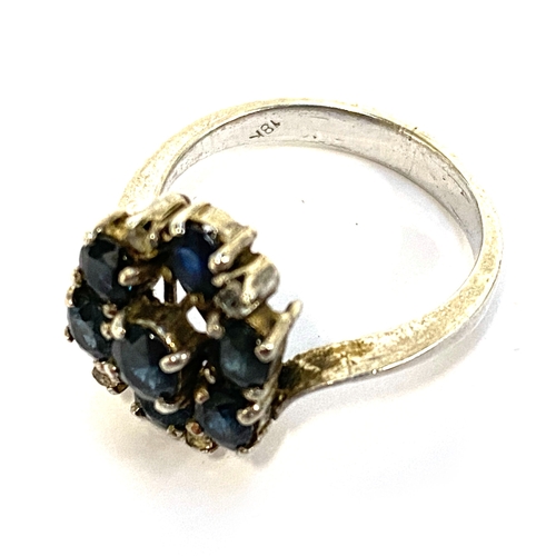 16 - A silver and sapphire cluster ring, size M 1/2, 4g