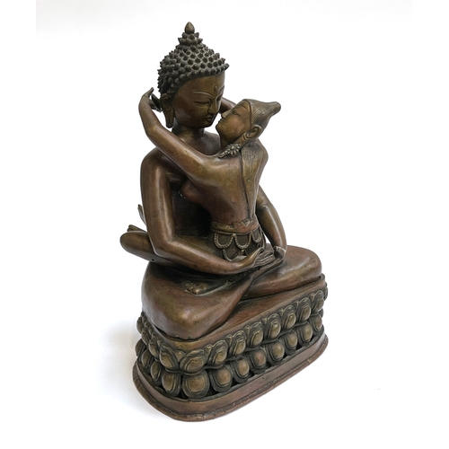 447 - A large early 20th century bronze Buddha Shakti tantric statue, engraved to base, 35cmH