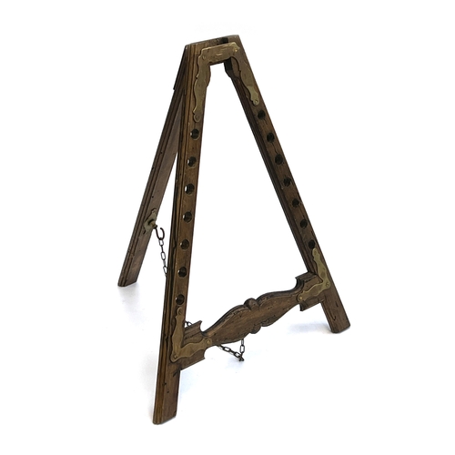 1073 - A oak and brass mounted display easel, approx. 46cmH