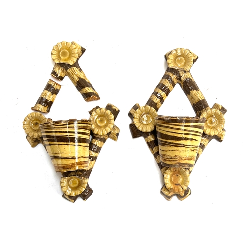 515 - A pair of unusual striped glaze wall planters (af, in need of repair), 30cmH