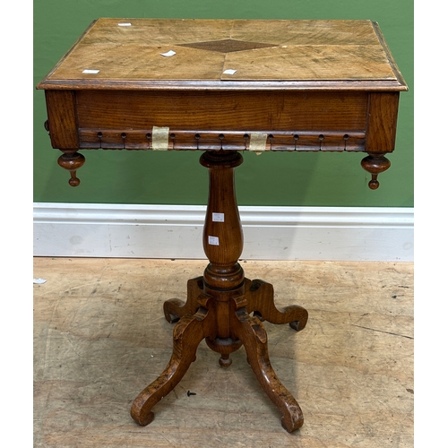 1091 - A small Victorian Gothic oak occasional table with quarter veneered top and central lozenge inlay, o... 