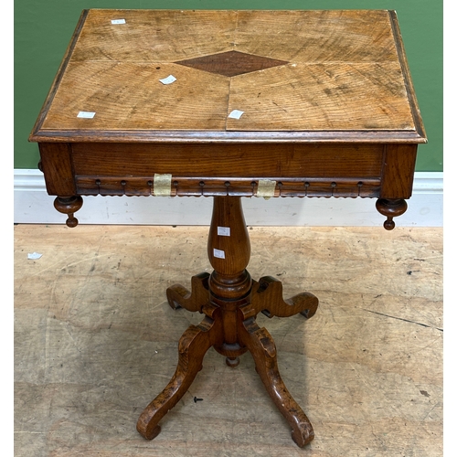 1091 - A small Victorian Gothic oak occasional table with quarter veneered top and central lozenge inlay, o... 