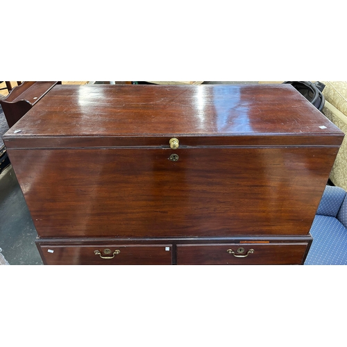 1092 - An unusual 18th century mahogany coffer on chest, the base with two short over two long drawers, on ... 