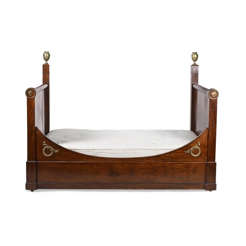 1259 - A Louis Philippe mahogany and ormolu mounted bed or lit en bateau, mid 19th century, 205cm long, 127... 