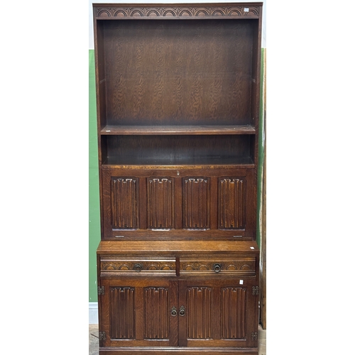 1301 - A pair of oak bookshelves with linen fold cupboards below approx. 92cmW 204cmH