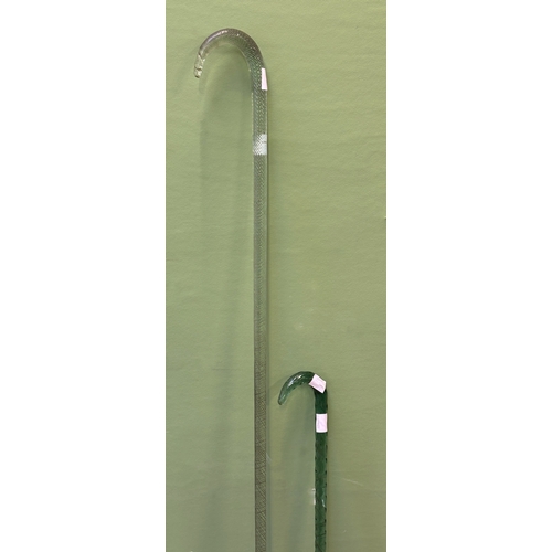 288 - Two Victorian 'frigger' glass walking canes, both of twisted form, 133cmL and 92cmL