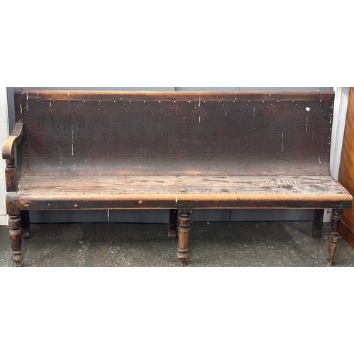 1030 - A very long bench/settle, in two parts, on turned front legs, approx. 400cmW