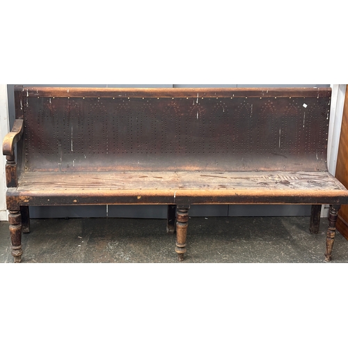 1030 - A very long bench/settle, in two parts, on turned front legs, approx. 400cmW