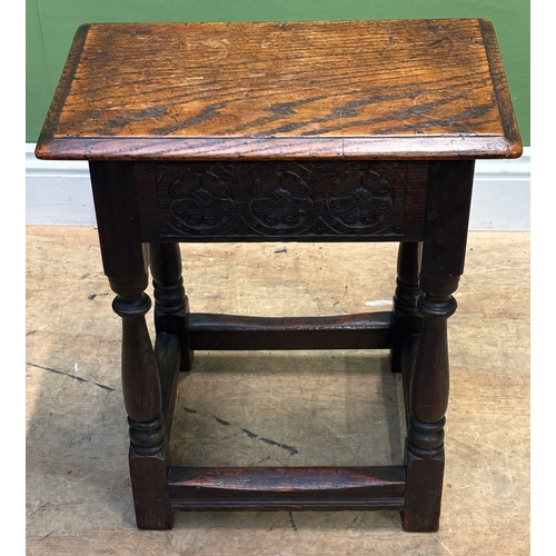 1097 - Two oak joint stools in 18th century style, one with carved frieze, 46x27x54cmH; the other a little ... 