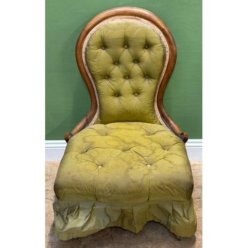 1119 - An olive green button upholstered bedroom chair on casters