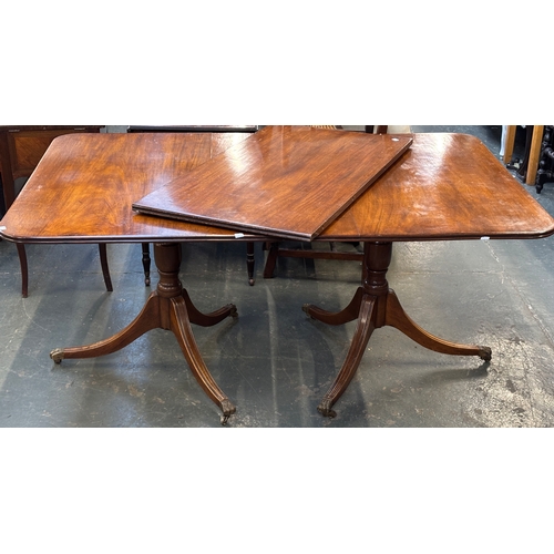 1152 - An 18th century and latyer twin pedestal dining table with spare leaf, period top with 20th century ... 