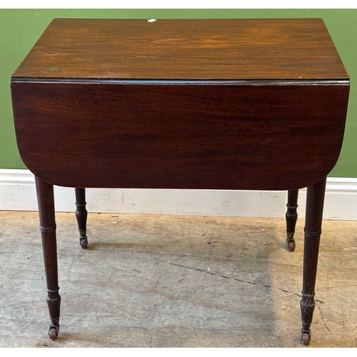 1177 - A Regency mahogany Pembroke table with single end drawer on ring turned tapering legs on brass caps ... 
