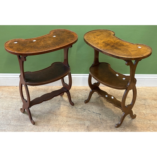 1201 - A pair of walnut veneer kidney shaped occasional tables with undershelf, 62cmW 70cmH