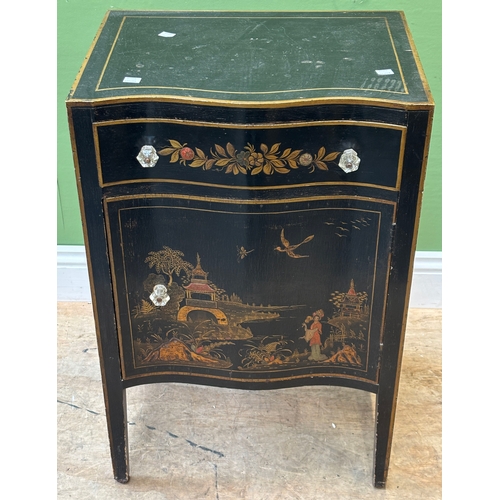 1176 - A black lacquered and gilt chinoiserie serpentine cabinet with single drawer over cupboard opening t... 