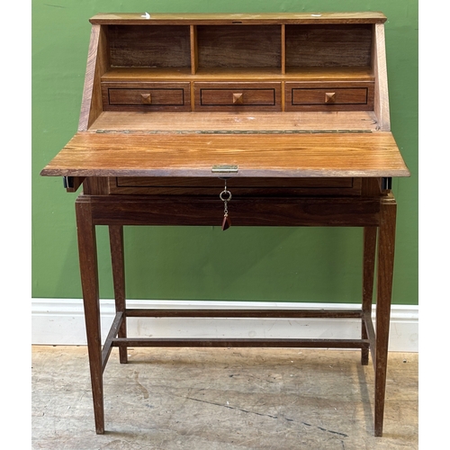 1181 - A small hardwood bureau with ebony and bone inlay over a single drawer 75cmW